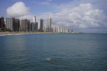 Obraz premium A very beautiful, wide sandy beach in northeastern Brazil, on the Atlantic Ocean in Fortaleza – Ceará, Brazil..