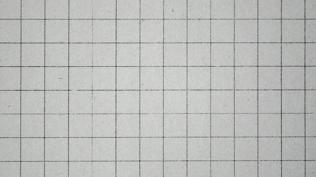 Close-up of a gray paper grid background with black lines and dotted lines forming squares, seamless texture for graphic design and creative projects