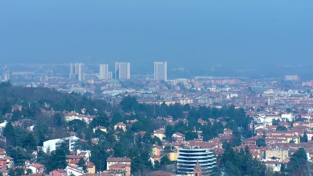View of the city of Bologna from the hills (Croara park). The exhibition center can be seen in the distance.