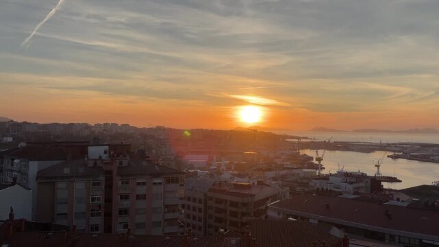 Golden sunset over Vigo harbor and Atlantic coastline, Spain