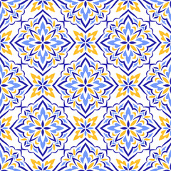 Fototapeta premium Mediterranean blue yellow seamless pattern on white background. Azulejo or majolica tile. Portuguese, Moroccan, Sicilian, Spanish folk motifs. Geometric mosaic, floral ornament. Vector illustration