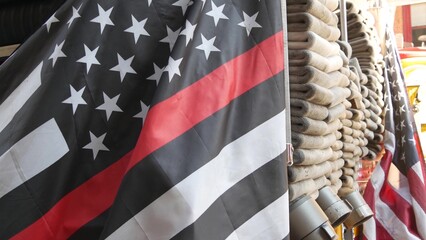 Red thin line black american flag on firefighter truck. Hose of firetruck and fire fighters symbol...