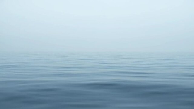 Abstract ocean view with calm water and gradient sky