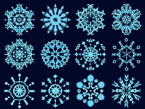 A collection of detailed light blue snowflake illustrations against a dark background