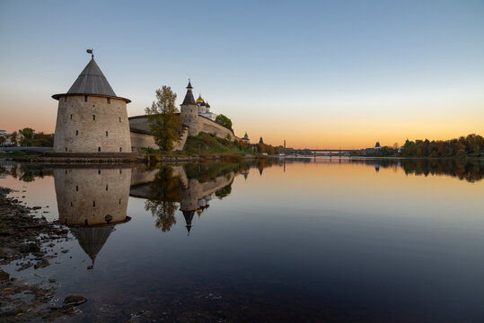 Sunset on the Velikaya River. The historical center of Pskov. Russia