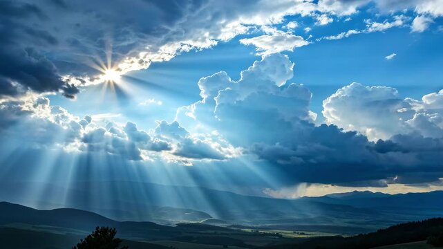 Sunbeams through dramatic clouds over rolling hills