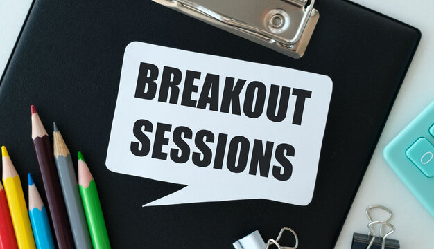 Breakout Sessions text in speech bubble on office clipboard