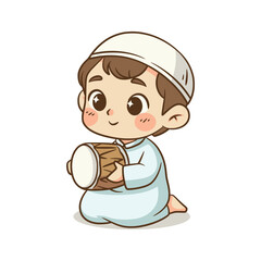 Little Muslim boy sitting while playing a small traditional hand drum