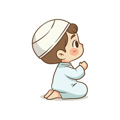 Side view of Muslim boy kneeling in prayer position with hands together