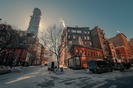 Beautiful view of the Jenga Tower in Manhattan, New York City, USA, on a sunny but cold winter day, with the Ghostbusters Headquarters on the right
