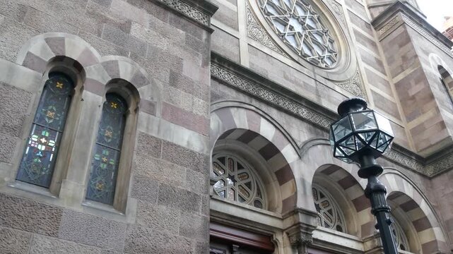 New York Central Synagogue old historic building 1872, Lexington avenue, United States of America. Jewish congregation in Manhattan. Judaism religion landmark. Star of David geometry ornament. Window.