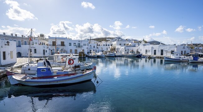 Fishing boats in Naoussa harbour, White Cycladic houses, Naoussa, Paros, Cyclades, Greece