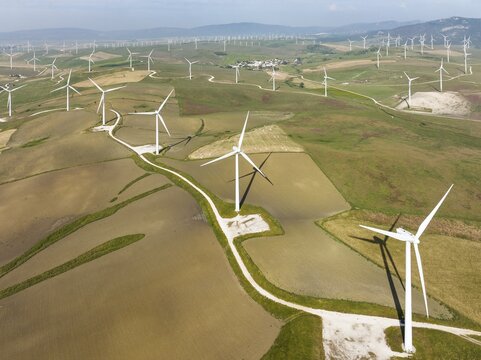 Windmills on a wind farm near Zahara de los Atunes, aerial view, drone shot, C&aacute;diz province, Andalusia, Spain