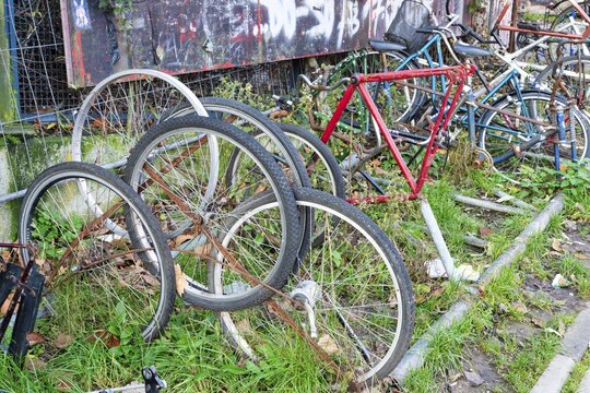 Junkyard, damaged bicycles in public space, Cologne, North Rhine-Westphalia, Germany