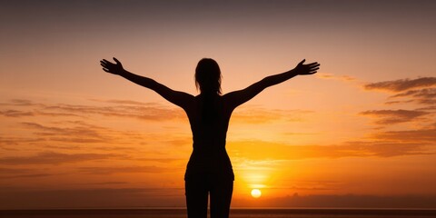Silhouette of Woman with Raised Arms at Sunset Freedom and Inspiration Concept