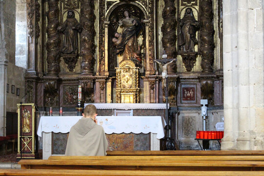 Monk or Priest Praying before Golden Tabernacle Melide July 2024