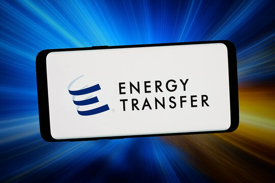Stuttgart, Germany - 02-20-2026: In this photo illustration, the logo of US pipeline company Energy Transfer LP is displayed on a smartphone in front of abstract background on computer screen.