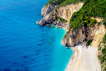 Emerald color water Ionian Sea on coast from above Greece, sea cliffs on island Corfu, Stelari Beach. Greek Island Vacation Background © Tomasz