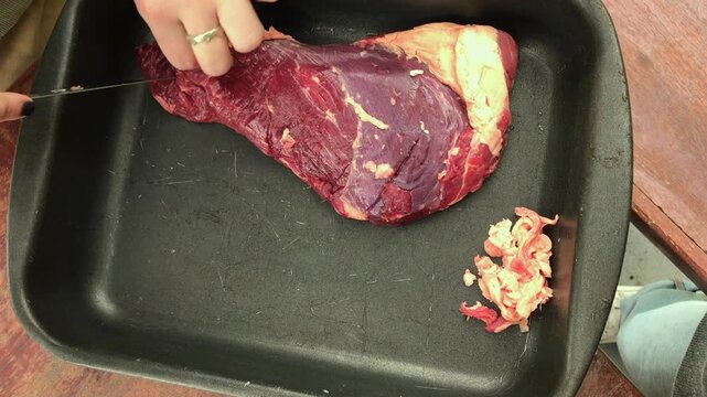 Traditional Argentine Barbecue Meat Prep &ndash; Salting Raw Beef Before Cooking