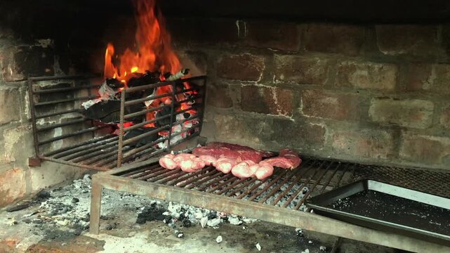 Charcoal Fire, Beef and red meat on Parrilla &ndash; Argentine BBQ Tradition, Asado