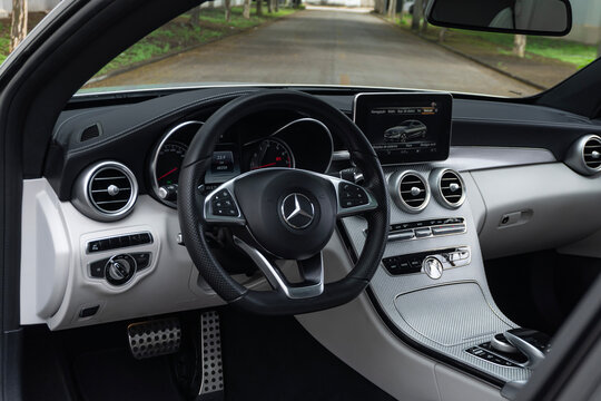 Mercedes-AMG C43 interior dashboard and steering wheel view, Luxury sedan cockpit side view
