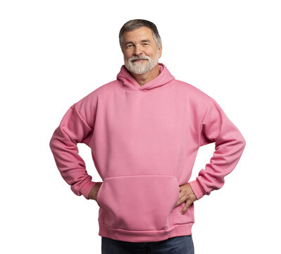 Caucasian smiling bearded mature man wearing pink hoodie on transparent background. Standing indoors