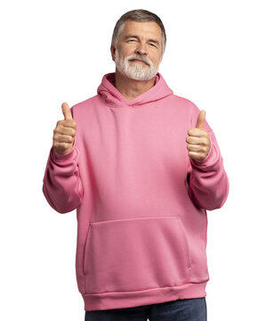 Attractive cheerful mature man wearing pink sweatshirt standing isolated over transparent background, showing thumbs up