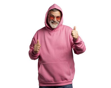 Attractive cheerful mature man wearing pink sweatshirt standing isolated over transparent background, showing thumbs up
