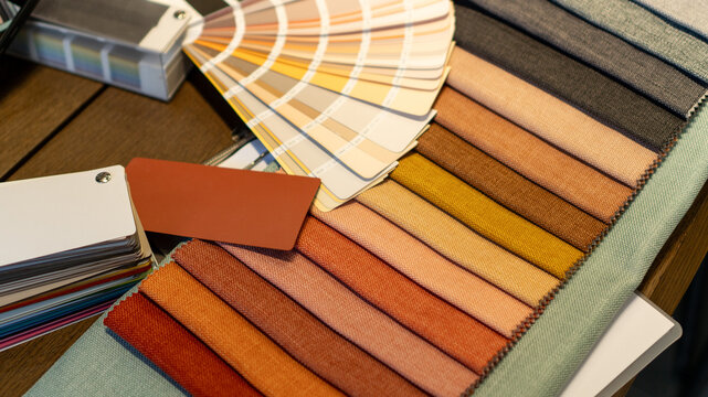 catalogs, samples, selection of fabric and curtain colors, color of walls, textiles and furniture. beige, orange, red, terracotta shades. exhibition samples, advertising, interior design