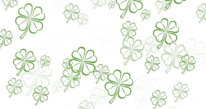 Digital animation of multiple clover leaves floating against white background