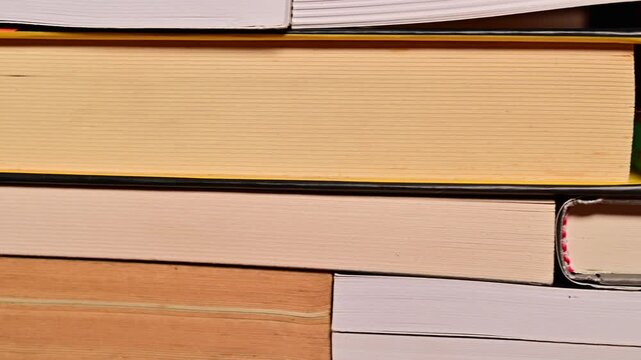 Close-Up of Neatly Arranged Books in a Row Wall &ndash; Minimal Interior Background