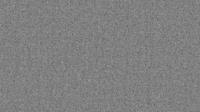 Realistic, subtle gray film grain texture. Seamless loop for adding a cinematic, vintage, or analog look to footage. Use with overlay or soft light blend modes for authentic effect