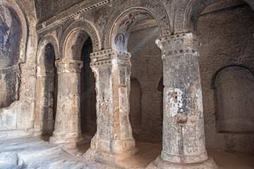 Fototapeta premium Interior architecture detail of ancient Byzantine Christian civilisation church ruins with rock-cut columns at Ihlara Valley Cappadocia Turkey