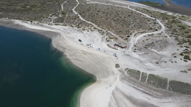 Camper Vans by the Turquoise Lagoon in Punta Perdices