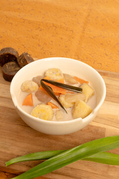 Indonesian Traditional Dessert Kolak Pisang Ubi in a White Bowl