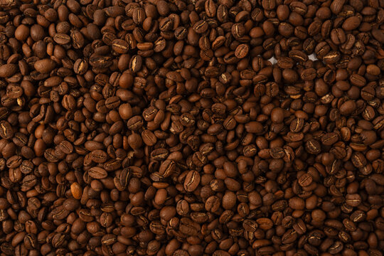 Coffee beans on a white background. Coffee beans texture.