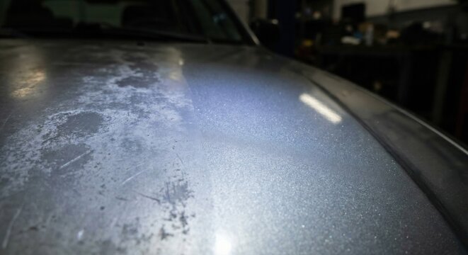 Silver car paint correction showing oxidation vs polished finish