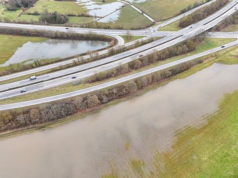 Aerial View of Highway Interchange and Flooded Rural Farmland After Heavy Rain