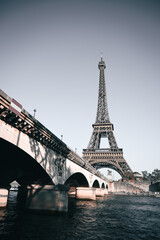 Obraz premium The Eiffel Tower along the River Seine in Paris, France.
