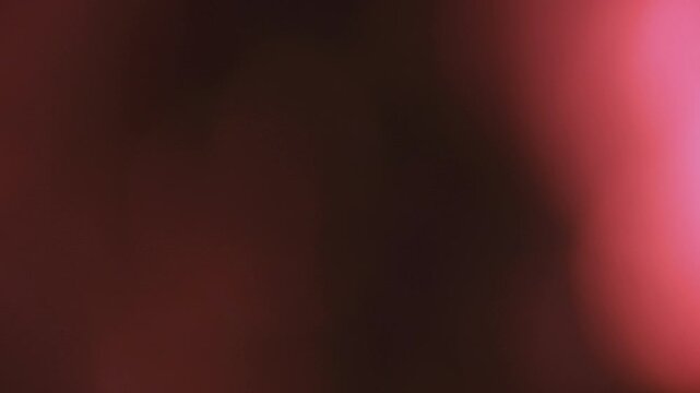 flash transition with red and pink light leak effects, perfect for adding dramatic flair to your videos. This footage is ideal for motion graphics and video editing.