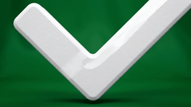 A white checkmark symbol is centered on a green background