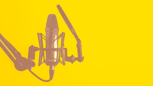Podcast microphone setup with yellow background for recording sessions