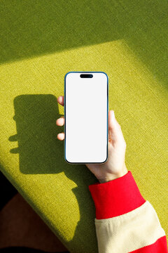 Phone Mockup with White Screen on Green Fabric