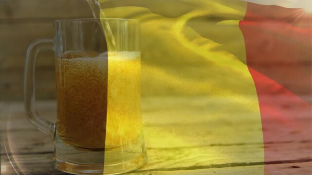 Tricolor flag starting to wave, sweeping over glass beer mug tinting amber liquid and swelling foam