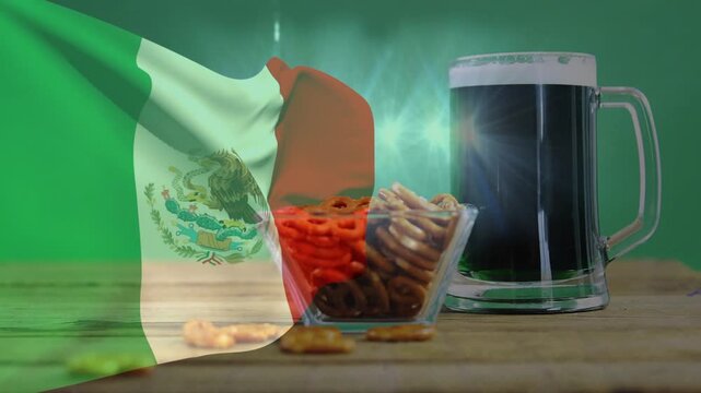 Mexican flag fading left, rippling, rotating, revealing pretzels and beer, highlighting snacks