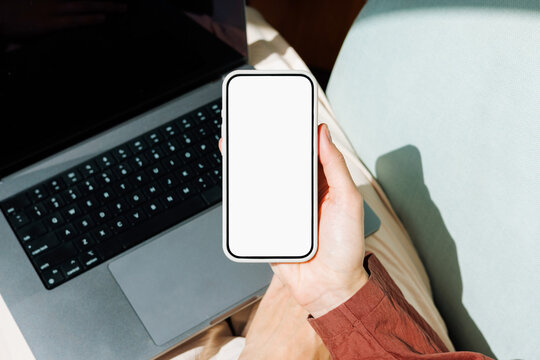 Phone Mockup with White Screen by Laptop