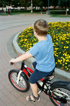 Child riding a tricycle