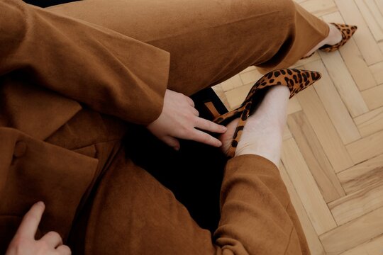 Woman in leopard print shoes