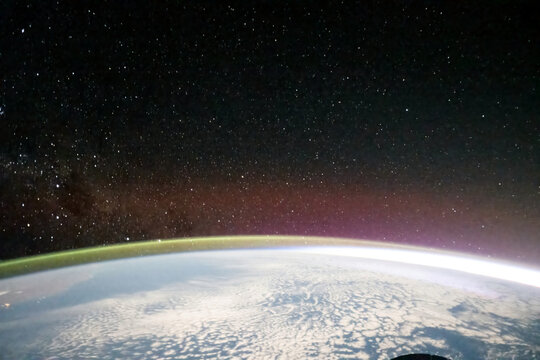 Dec 29 2025: View of Earth's horizon and atmosphere and stars from space, showcasing the planet's curvature and celestial expanse (Elements of this image furnished by NASA)