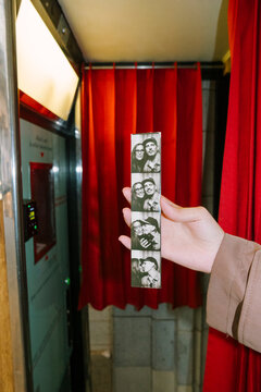 Close-up of hand holding photo strip